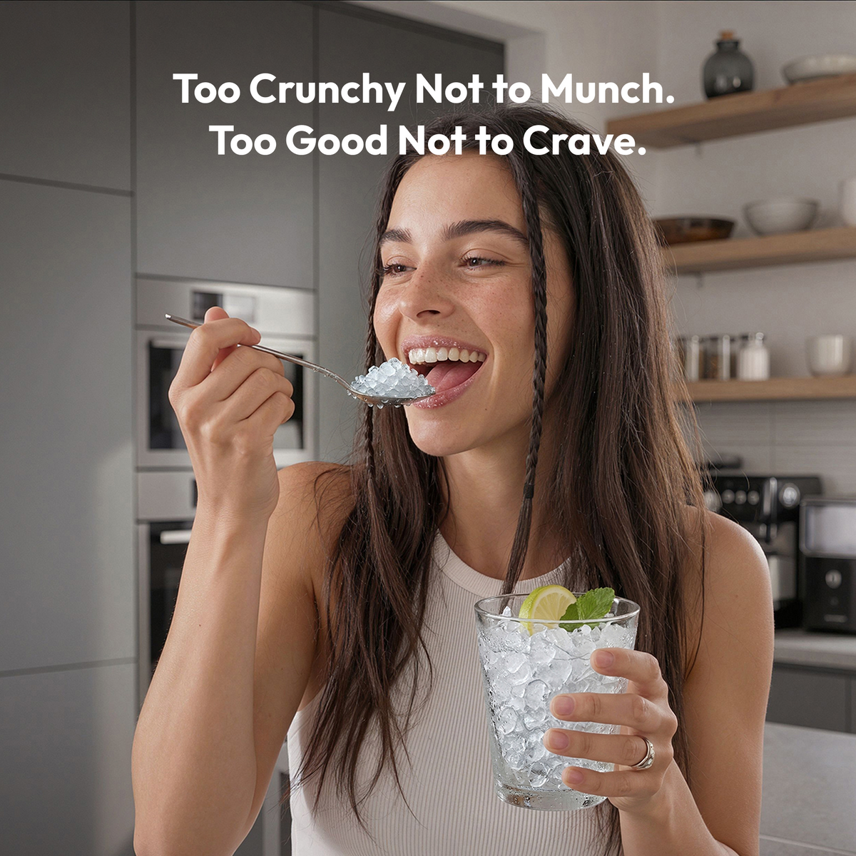 Woman enjoying nugget ice from a glass in a modern kitchen